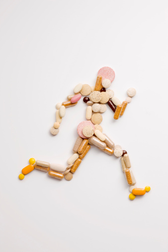 vitamins in a shape of a running person