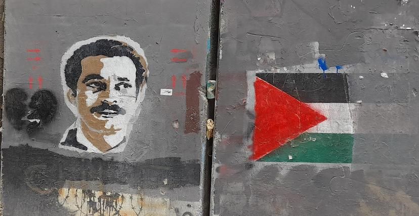 غرافيتي لـ غسان كنفاني على جدار الفصل العنصري